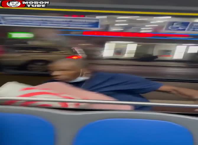 Video :This lunatic jumps out of a bus window after spitting on a passenger!